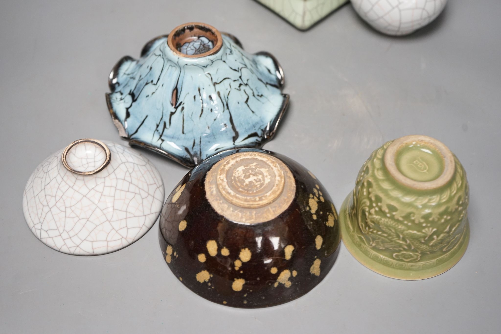 Chinese ceramics: three bowls, a cup and two vases, tallest vase 23cm